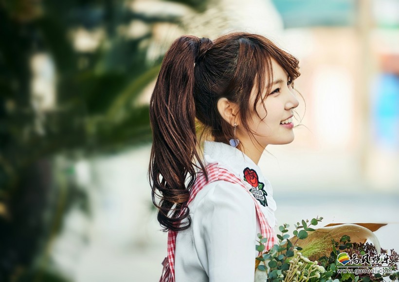 金誉媛跟随哪个组合推出先行单曲正式出道？她为何被誉为“正能量少女”