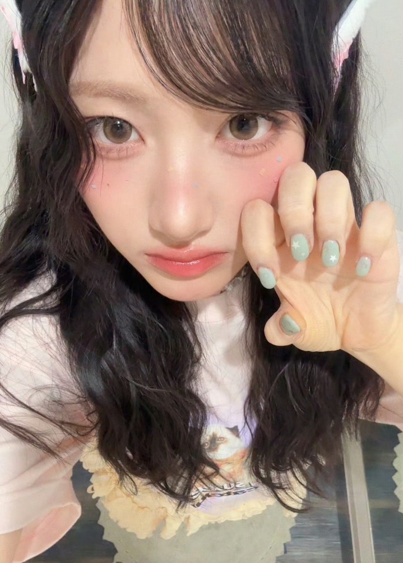 JUNHWI徐俊辉现为哪个组合成员副主舞？她因为哪个男团而喜欢上跳舞？